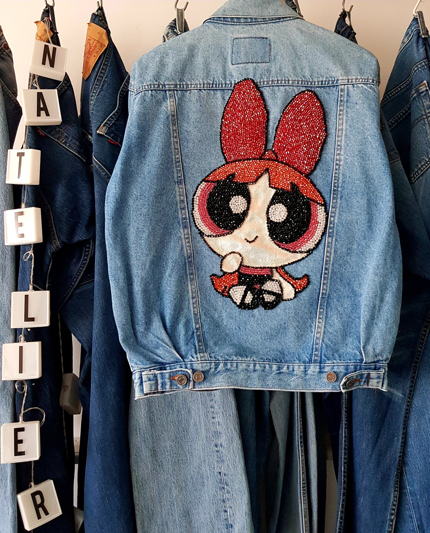 Customized pearls and crystals embroidery on personal jacket