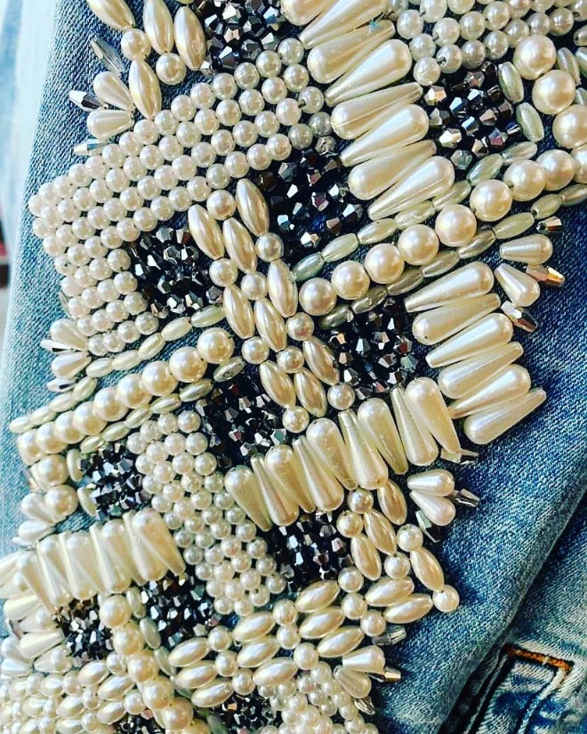 Pearls and crystals sleeves on jeans jacket
