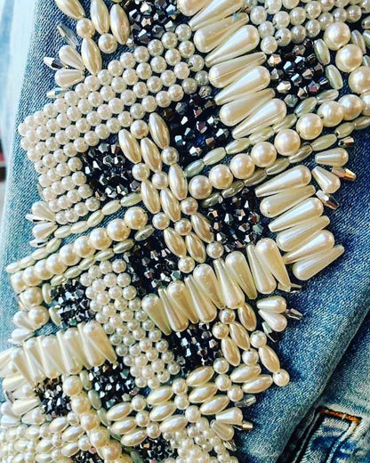Pearls and crystals sleeves on jeans jacket
