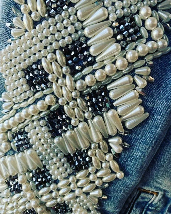 Pearls and crystals sleeves on jeans jacket